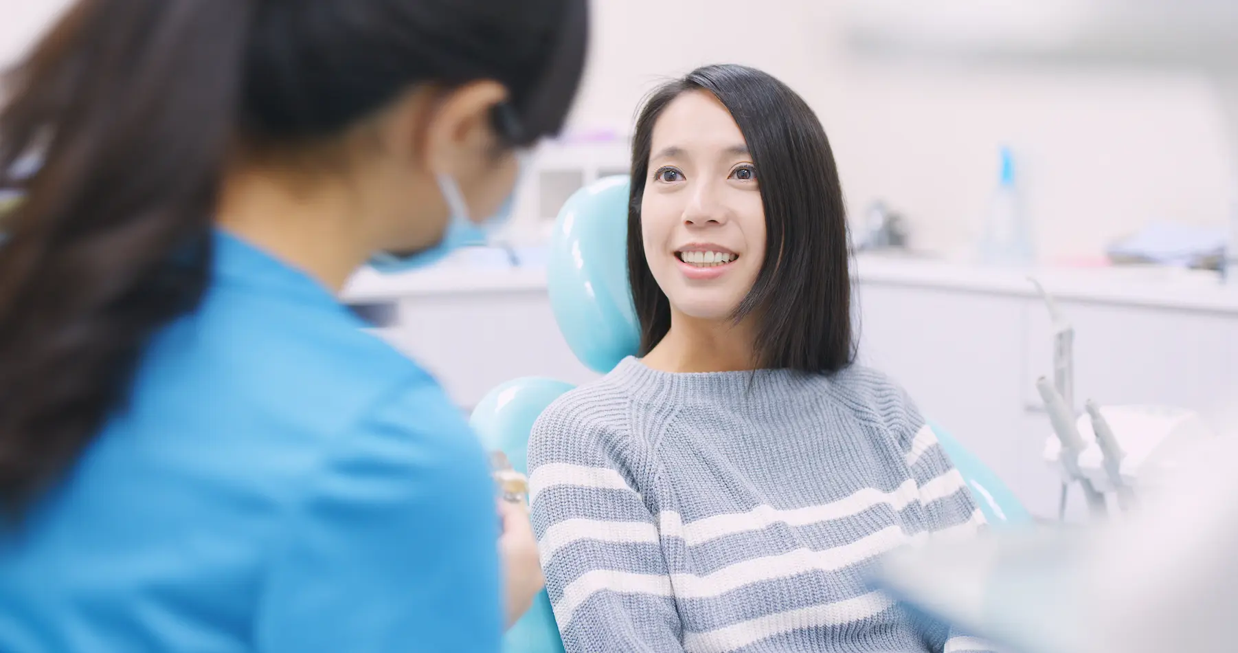 Japanese speaking dentist with a japanese patient